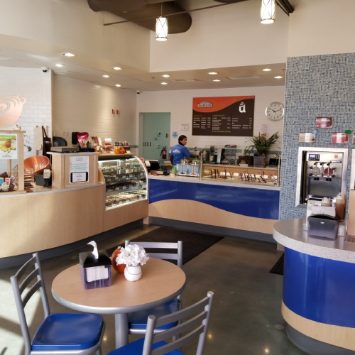 U-swirl - New Project 2025 05 15T154655.574 Cozy lounge area with modern furniture